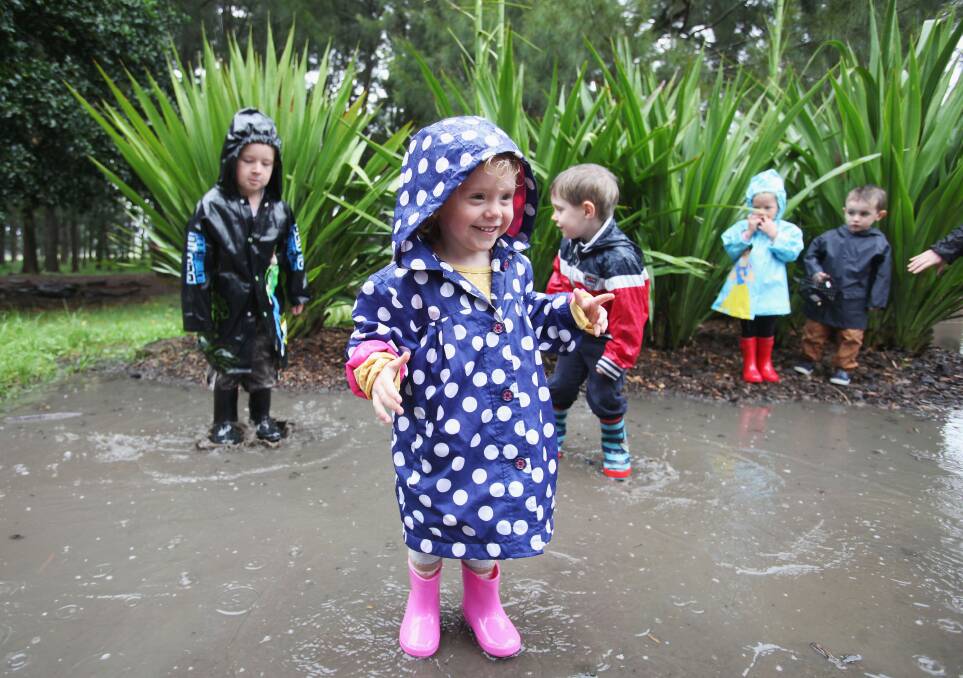 Raindance: Muddy puddles will bring smiles to faces at the Tarrington Swamp Stomp. Picture: Fiona Morris 