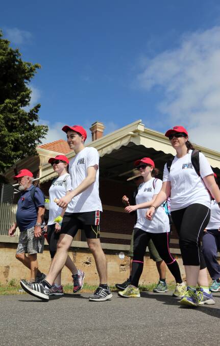 WALKING HOME: Participants in the Salvation Army walk in Koroit on their way to Warrnambool to raise awareness about homelessness. Picture: Rob Gunstone