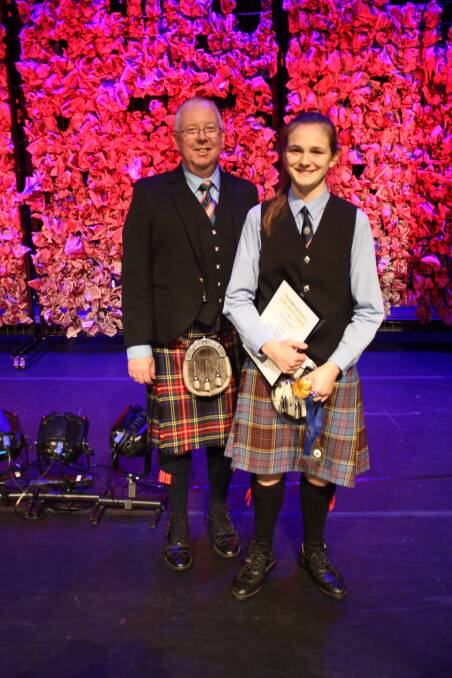 Hayley Riches with Victorian drumming vice-principal Andrew Womersley.