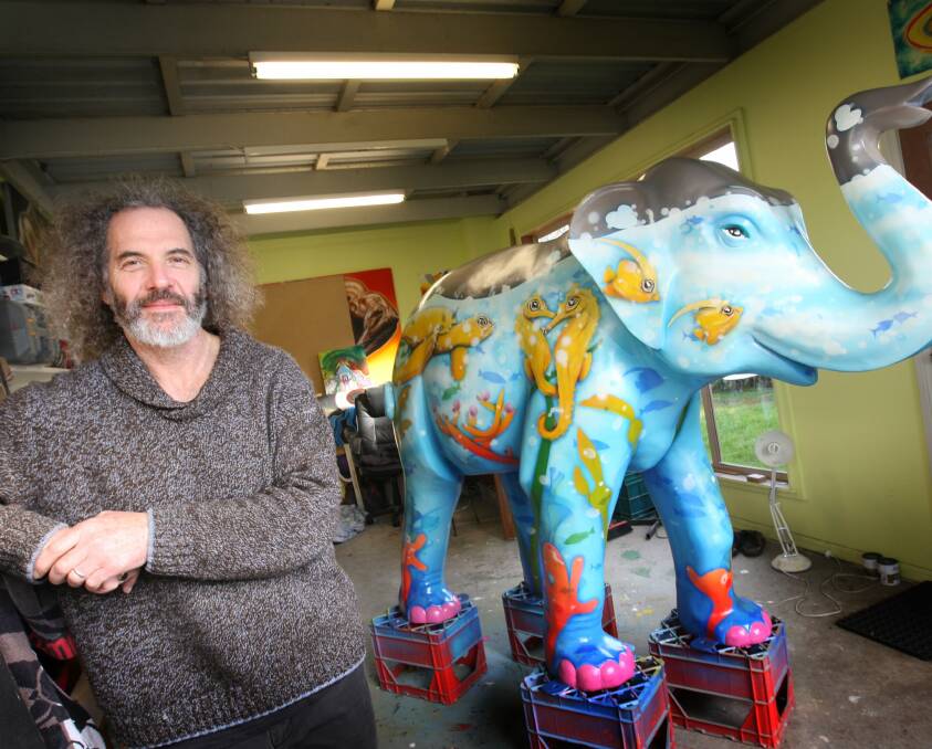 EXPOSING THE ARTS: David Higgins, pictured in his studio in 2012, is just one of the artists opening up their workspace to the public on Saturday as part of the Open Studios event.