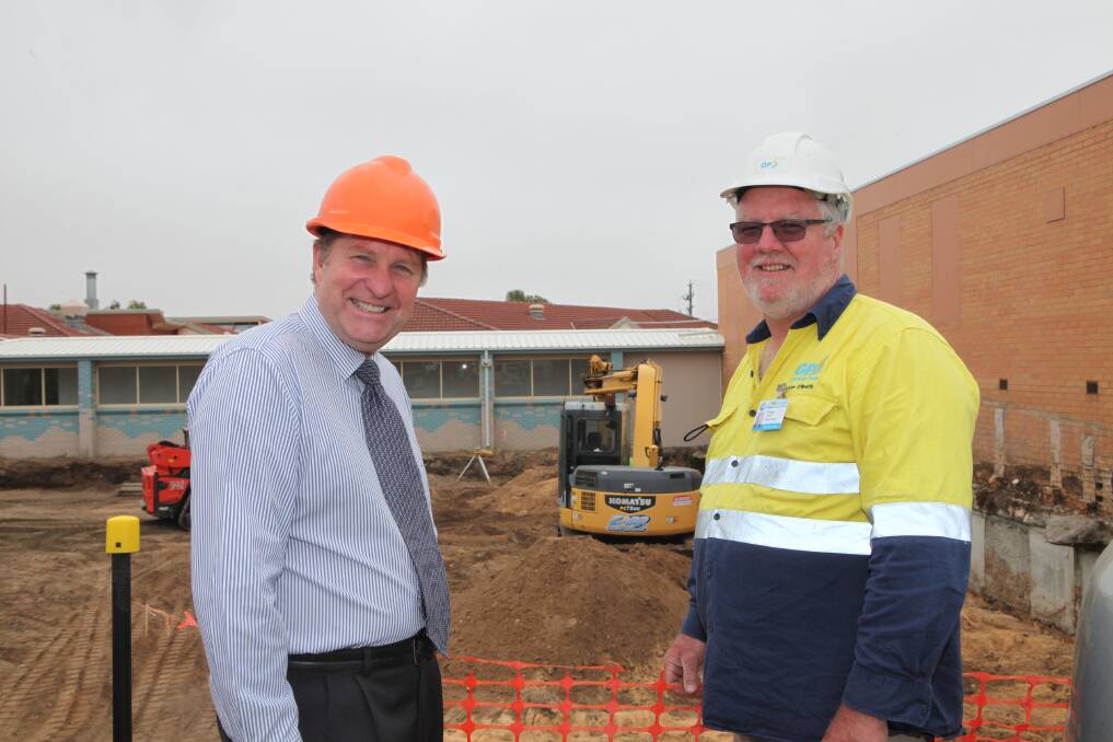 BUILD IT UP: Moyne Health Services chief executive David Lee and project manager Peter O'Keeffe at the site for the Port Fairy hospital redevelopment. Picture: Matt Neal