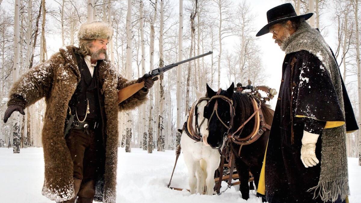 Kurt Russell and Samuel L Jackson size each other up in The Hateful Eight