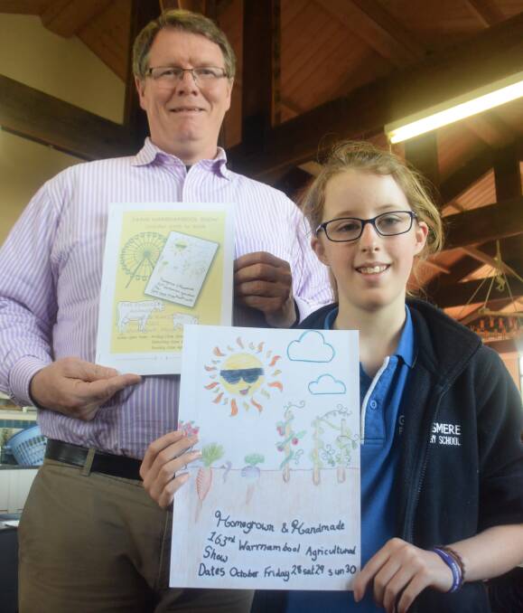 BEST IN SHOW: Warrnambool Agricultural Society manager Charles Hoddinott with Marlee Nickl and her winning artwork. Picture: Matt Neal
