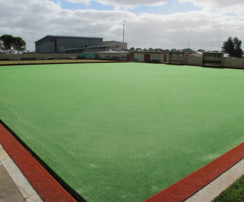 ROLLING IN THE GREEN: Koroit Bowls Club's main green went synthetic in 2011 - now its secondary green will also become synthetic thanks to Moyne Shire funding. Picture: Anthony Brady