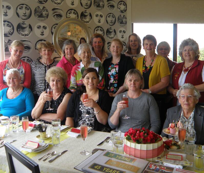 Time to celebrate: Warrnambool Fire Brigade Auxiliary members celebrate and reminisce at the group's 60th anniversary at high tea at Port Fairy's Time and Tide last weekend.