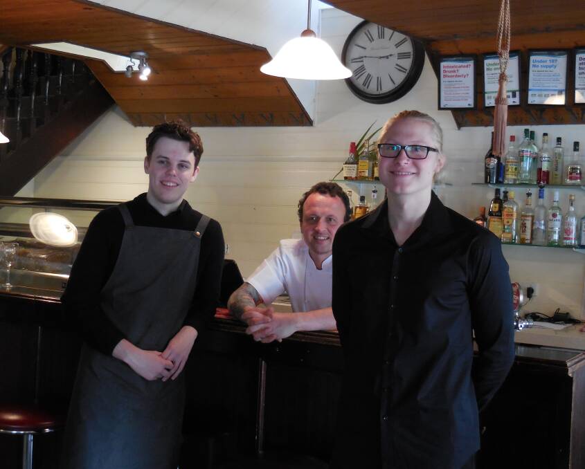 Ticket to Work: Proudfoot's Boathouse managing director Christopher Grace (centre) with waiters Matthew Eccles and Chase Andersson.