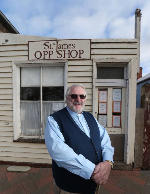 On the move: Mortlake Anglican Parish priest Geoff Humble outside the St James' op shop, which needs to find a new home. Picture: Damian White