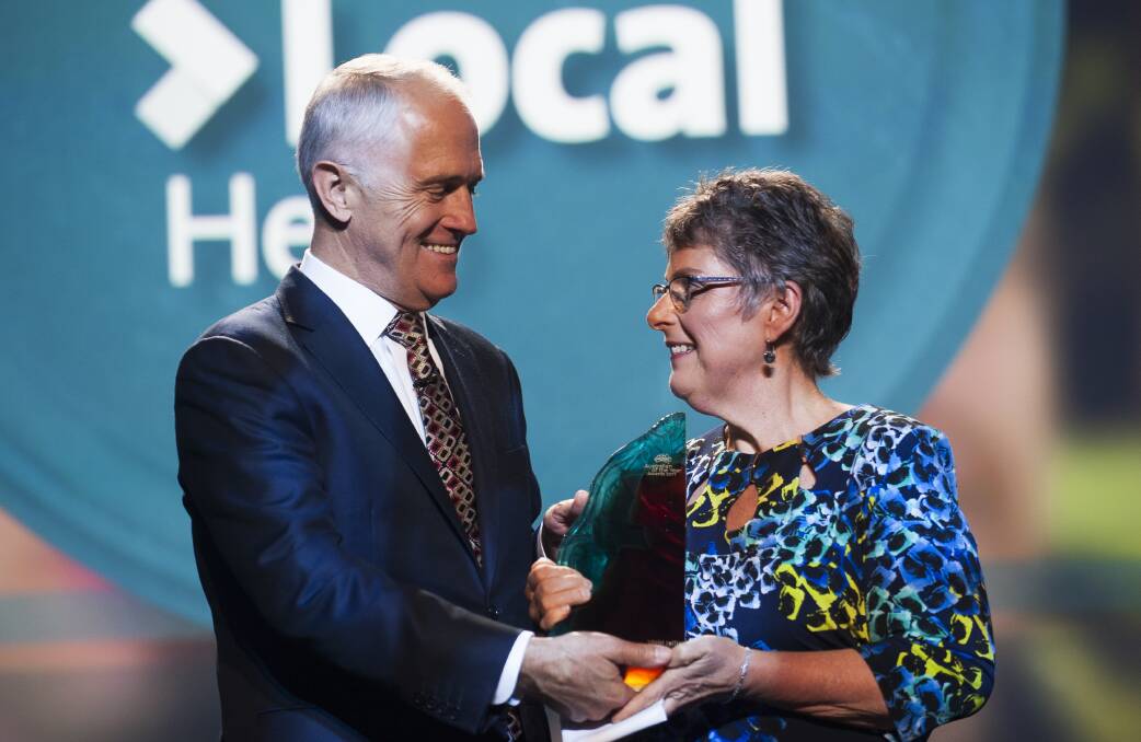 Honour: Peter's Project founder Vicki Jellie receives her Local Hero award from Prime Minister Malcolm Turnbull at the Australian of the Year awards in Canberra on Wednesday night. Picture: Elesa Kurtz