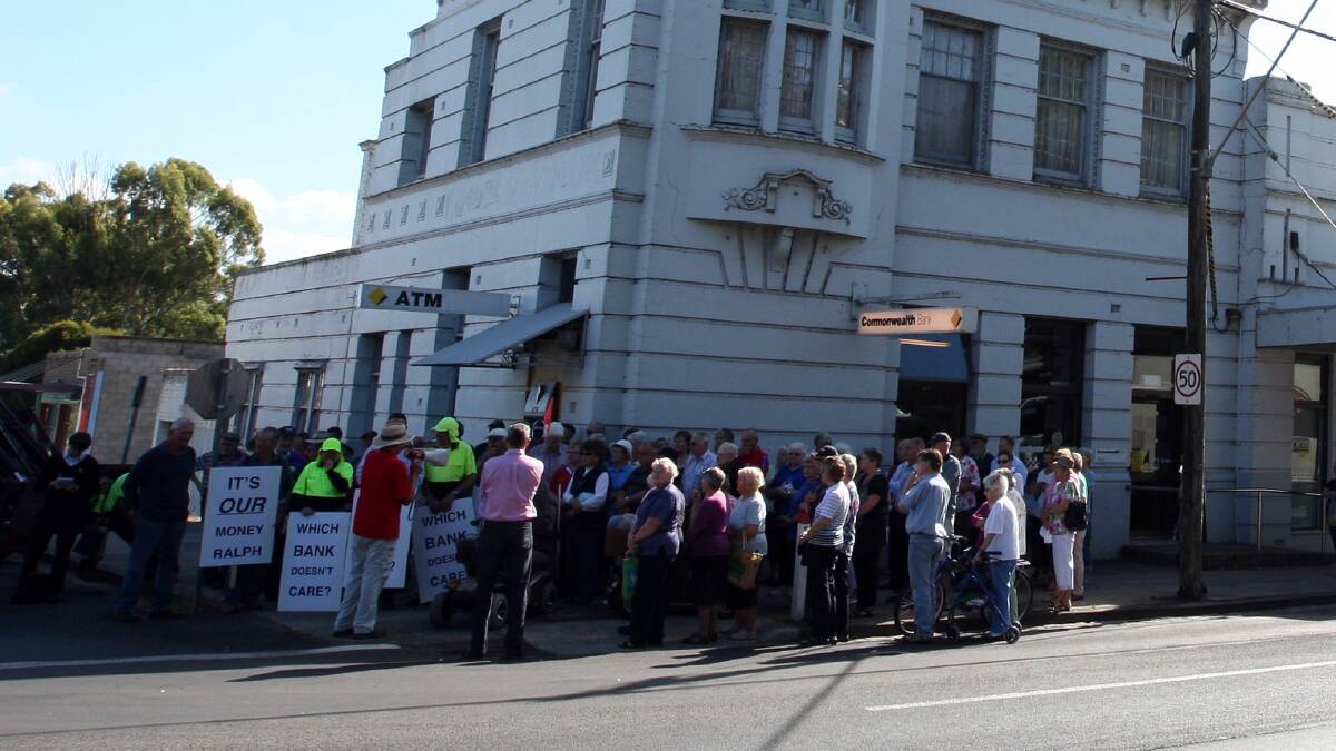 The fight continues: The Terang community protesting about reduced hours at its Commonwealth Bank in 2012. The branch closed this year, along with the ANZ in 2016. The town's last remaining bank, NAB, has reduced hours.