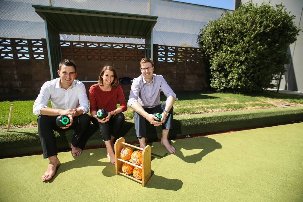 Ready to roll: Young Professionals Warrnambool members Steve Aberline, Aime Sandri and James Castley gear up for the barefoot bowls event on Australia Day eve. Picture: Amy Paton