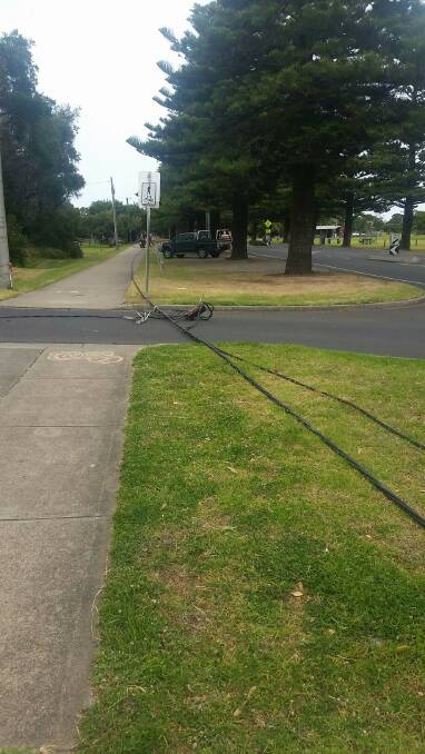 Crane knocks down power cable on Pertobe Road