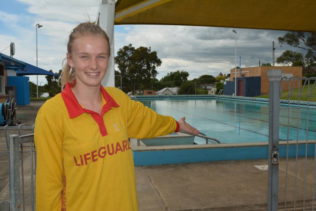 Summer fun: Camperdown pool manager Emma Lucas gets ready to welcome the summer crowds. Picture: Lucy Vesey