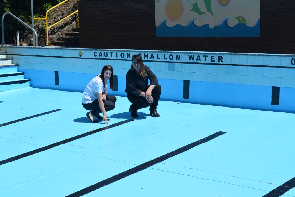 Corangamite Shire recreation development officer Angela Northcott and YMCA pools co-ordinator Lee Edge inspecting work done at Cobden Pool before the season opening.