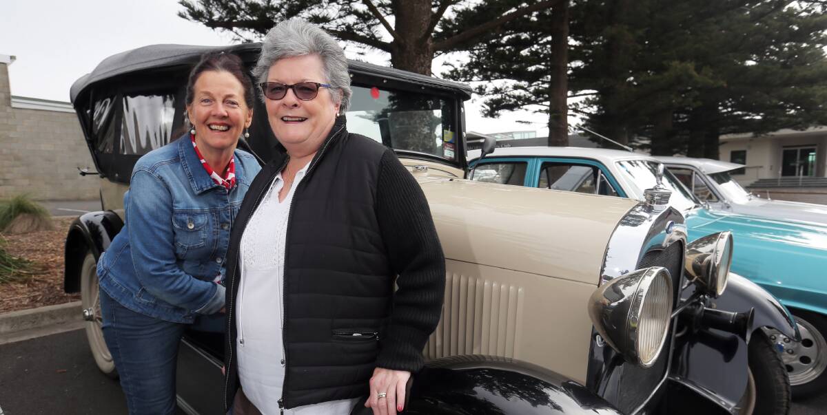 Just cruising: Sue Gardner and Lyn Lehane, both of Warrnambool, are excited about a ride in an 87-year-old Model A Ford, during the Celebrage Vintage Car Rally. Picture: Rob Gunstone