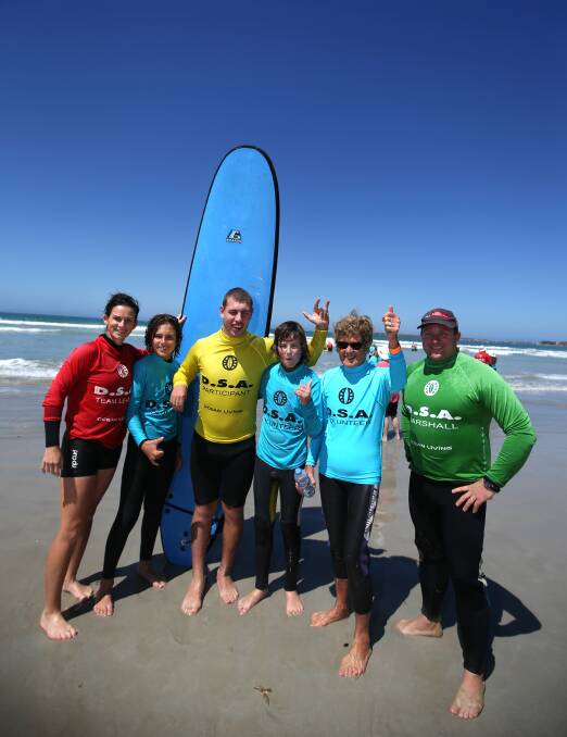 Hitting the waves: Sarah Moncrieff, Charlie Moncrieff, participant Ryan Christie, Noah Ansell, Mary Page and branch president Justin Houlihan. Picture: Amy Paton