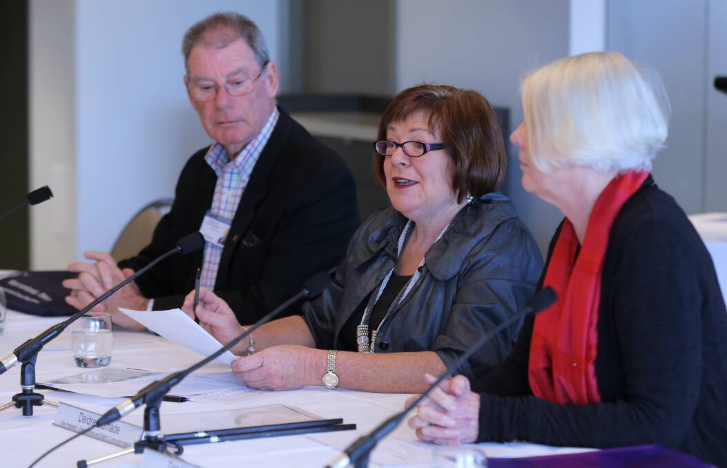 In touch: Warrnambool and District Community Hospice members Damian Goss, Deirdre Bidmade and Tam Vistarina talk to a committee of MPs at the end of life choices hearing. Picture: Rob Gunstone