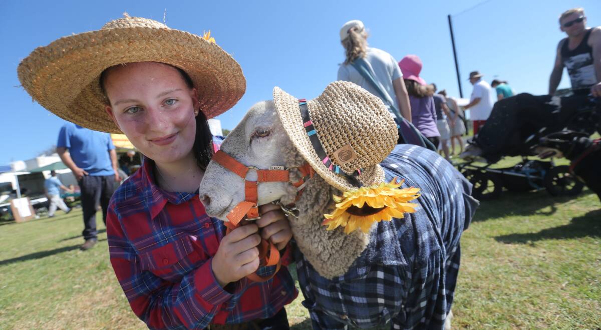 Family fun: Natalie Johnstone, of Portland, with ''Big Ears'' dressed to impress in the pet dress-up competition at last year's Tyrendarra show. 