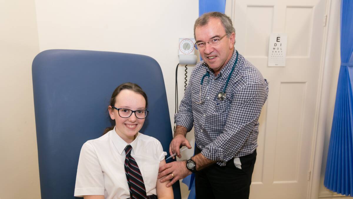 BETTER SAFE THAN SORRY: Year 12 Emmanuel College student Sarah Zerbe with Warrnambool City Council Chief Medical Officer Dr Philip Hall.

