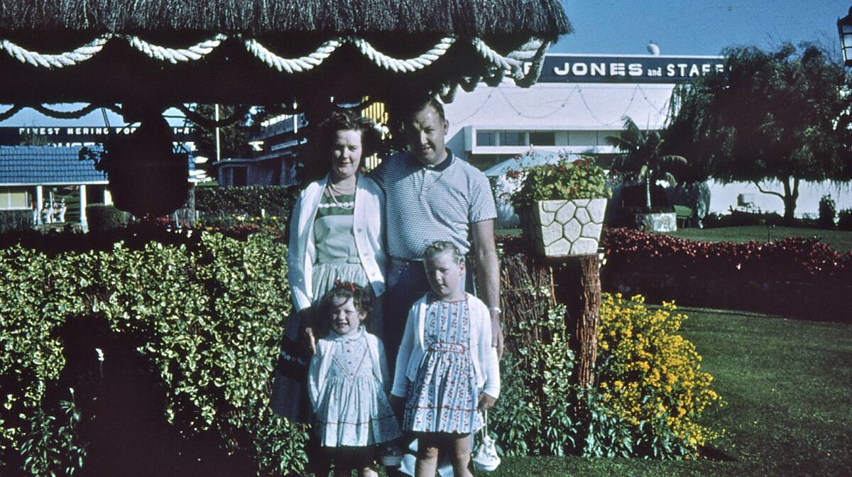 THEN: Project coordinator Julie Eagles, front right, in the Fletcher Jones gardens in the 1960's with her mother Margaret, father Des and sister Debbie.