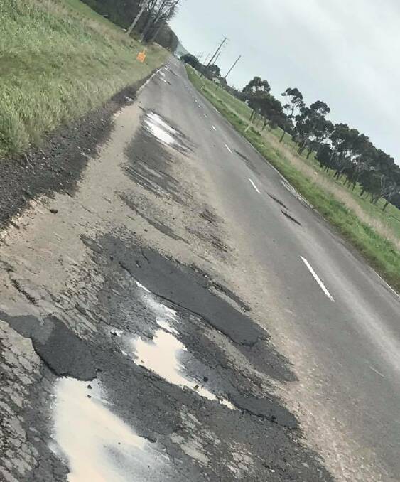 DAMAGE: A reader took this photo of potholes on the Terang Mortlake Road. Tyre repair businesses say they are seeing more people with damaged tyres.