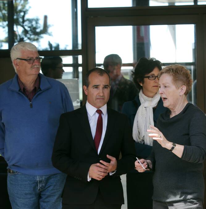 VISIT: Education Minister James Merlino is shown around the Warrnambool Special Developmental School by then acting principal Sue Fraser in 2014. 