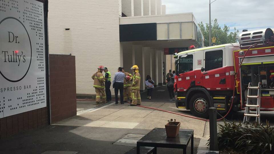 FIRE: Police talk to firefighters after another deliberatly lit fire in the Warrnambool CBD.
