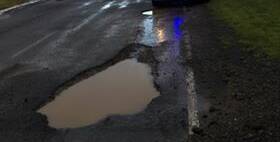 ROADS HIT: A reader sent this photo to The Standard of a pothole on the Mailors Flat Caramut Road last Wednesday after days of rain.