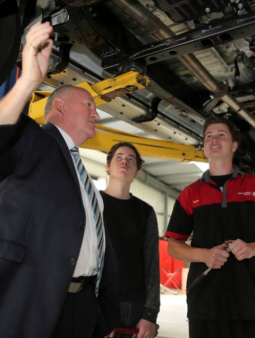 JOB READY: Minister for Training and Skills Steve Herbert meets apprentices Nick Lourey, 16, Dylan McCosh, and Jack Gale at Warrnambool Toyota. Picture: Rob Gunstone