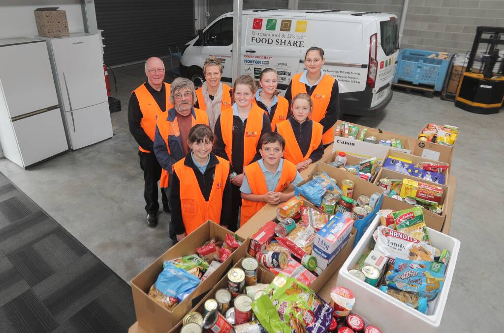 Helping hand: The Warrnambool East Primary School community donated 160-kilograms of non-perishable items to Warrnambool and District Food Share as part of a drive organised by the school's leaders. Picture: Morgan Hancock