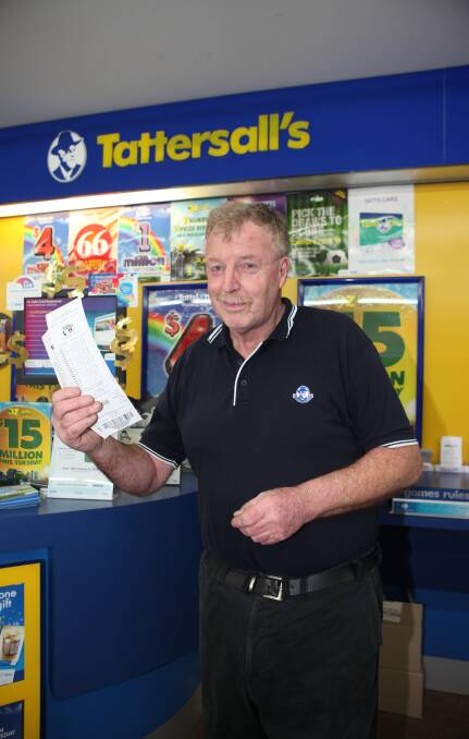 Winner: Koroit Newsagency and TattsLotto owner Bob Shanahan celebrates the agency's first division prize win. Photo: Anthony Brady 