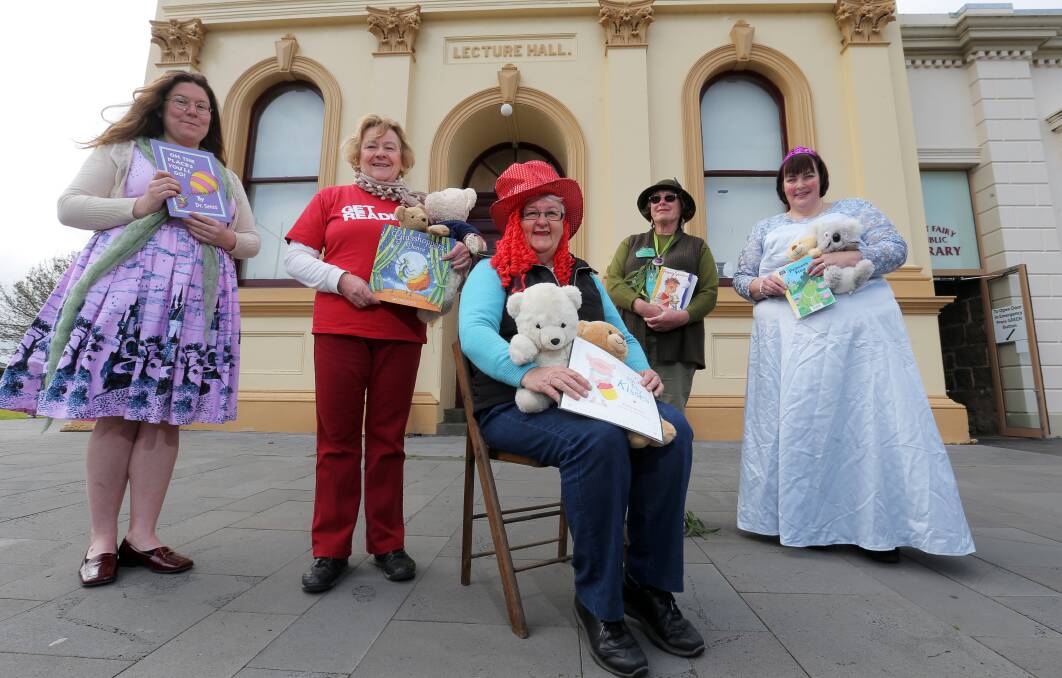 Ex Libris committee and community members Celia King, Jenny McLean, Hester Woodrup, Wendy Smyrk, and Elaine Day dressed up to read stories to primary school children as part of Ex Libris festival activities. Picture Rob Gunstone.

