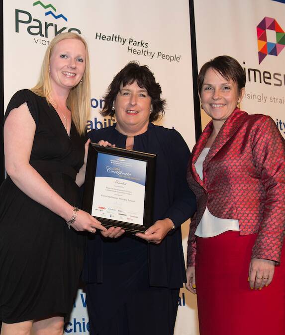 Success: Regional Development minister Jaala Pulford (right) congratulates Koroit and District Primary School's Nicole Farrelly and former principal Michelle Bickley-Miller on their award win. 