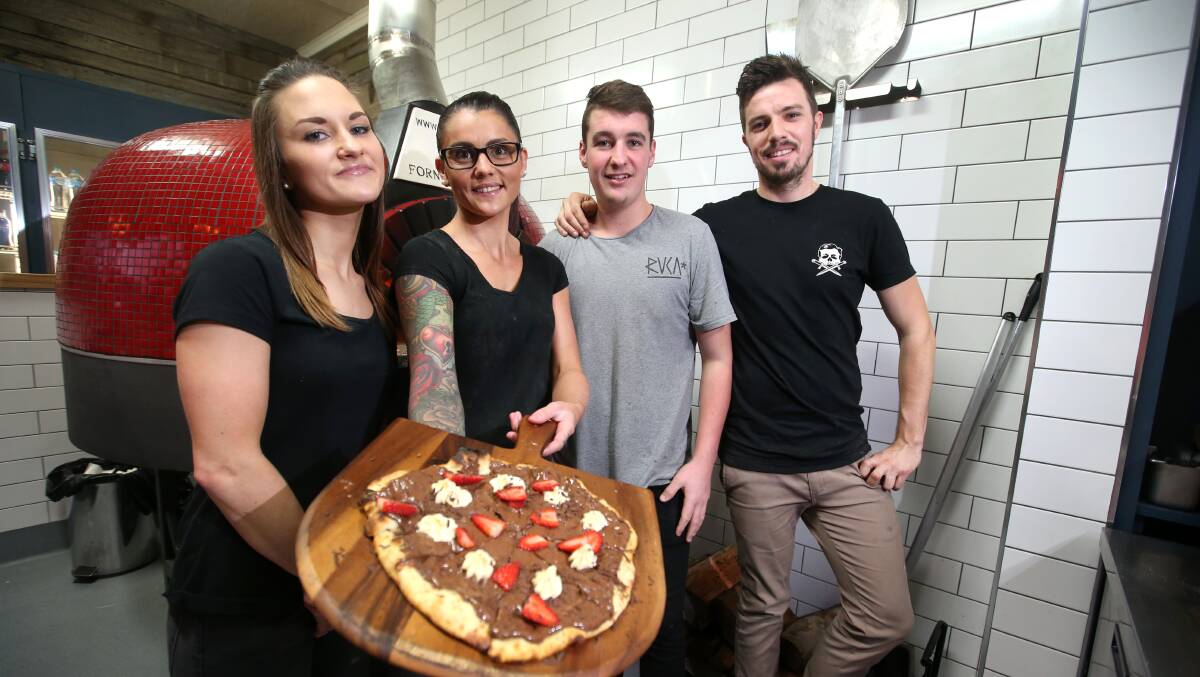 Pizza time: Mister Brightside staff Kellie Bond, Sammy Wood, Tim Douglass and owner Jarrod McSween with a Nutella dessert pizza. Picture: Amy Paton