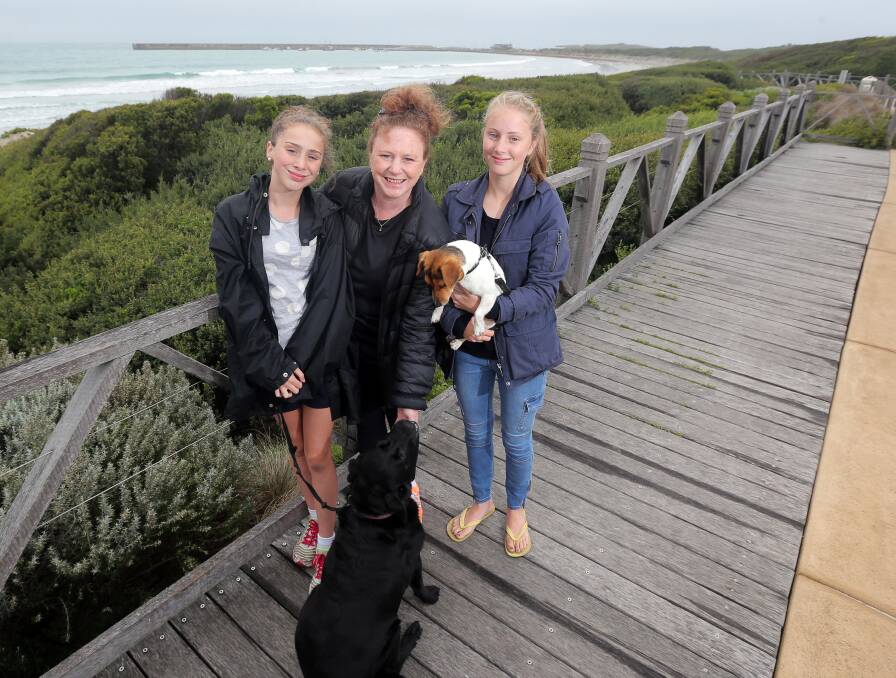 Active: Armelle Gaston, 13, mum Kylie Gaston, and Ana Gaston, 16 - with their dogs Milou and Zoe - regularly walk along the promenade. Picture: Rob Gunstone