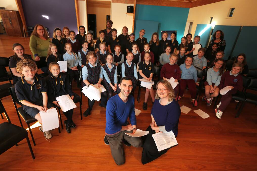Masterclass: Victorian Opera production manager Luke Hales and head of music Phoebe Briggs work with Port Fairy Consolidated and St Patrick's primary school students. Picture: Rob Gunstone