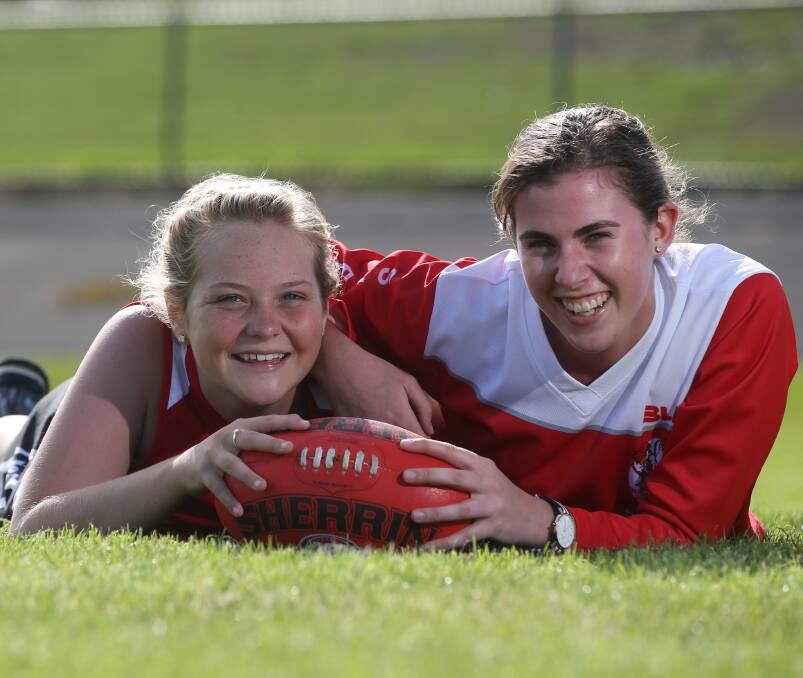 Promising: Mackenzie Creed and Grace Simpson are looking forward to playing in a new female football team. Picture: Vicky Hughson  