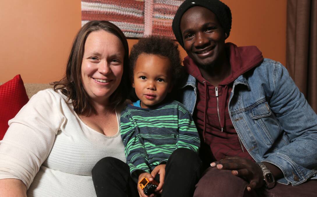 Hope: Catherine Ryan and Seif Sakate, with their son Kolo, 3, are appealing for people to sponsor Bandari School students. Picture: Rob Gunstone