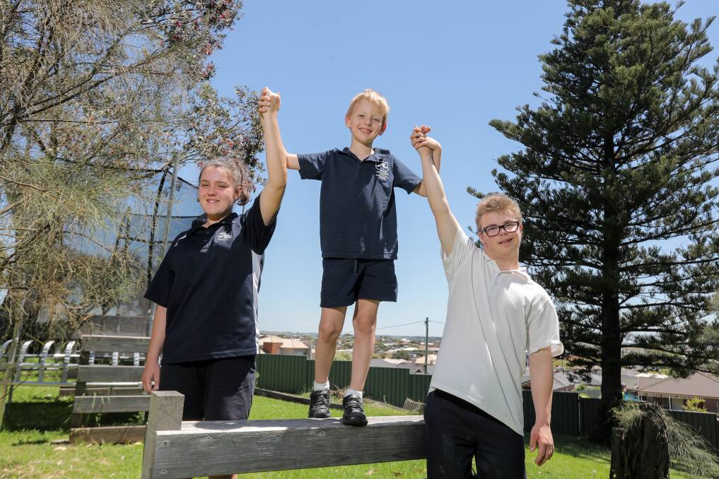 Ready: Warrnambool Special Developmental School students Nikita Triance, 14, Devon, 6, and Caleb Cocking, 16, have been training for the Tower Hill Challenge which is on December 2. Picture: Rob Gunstone