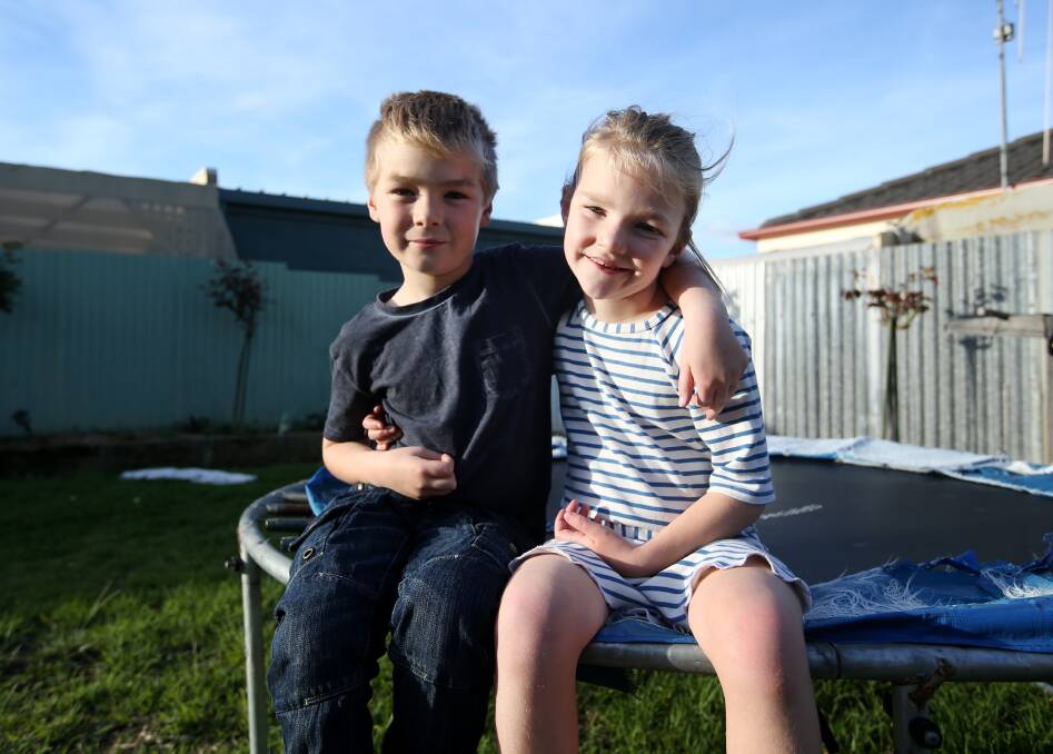 Siblings: Jackson and Charlie McNaughton take some time out from playing. Charlie, 6, has a non-cancerous brain tumour. Picture: Amy Paton
