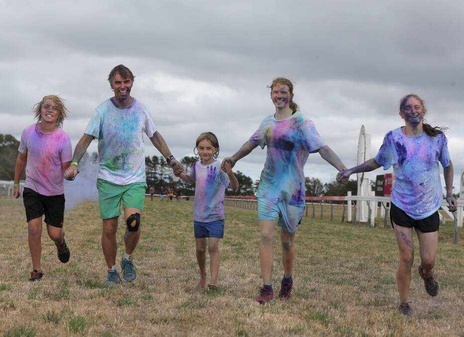 Colourful fun: Port Fairy will host a colour run on Friday similar to a previous event held in Mortlake which Darcy Nelson Hill, Jason Hill, Padraig Nelson Hill, Lucia Philipp, and Alana Johnson participated in. 