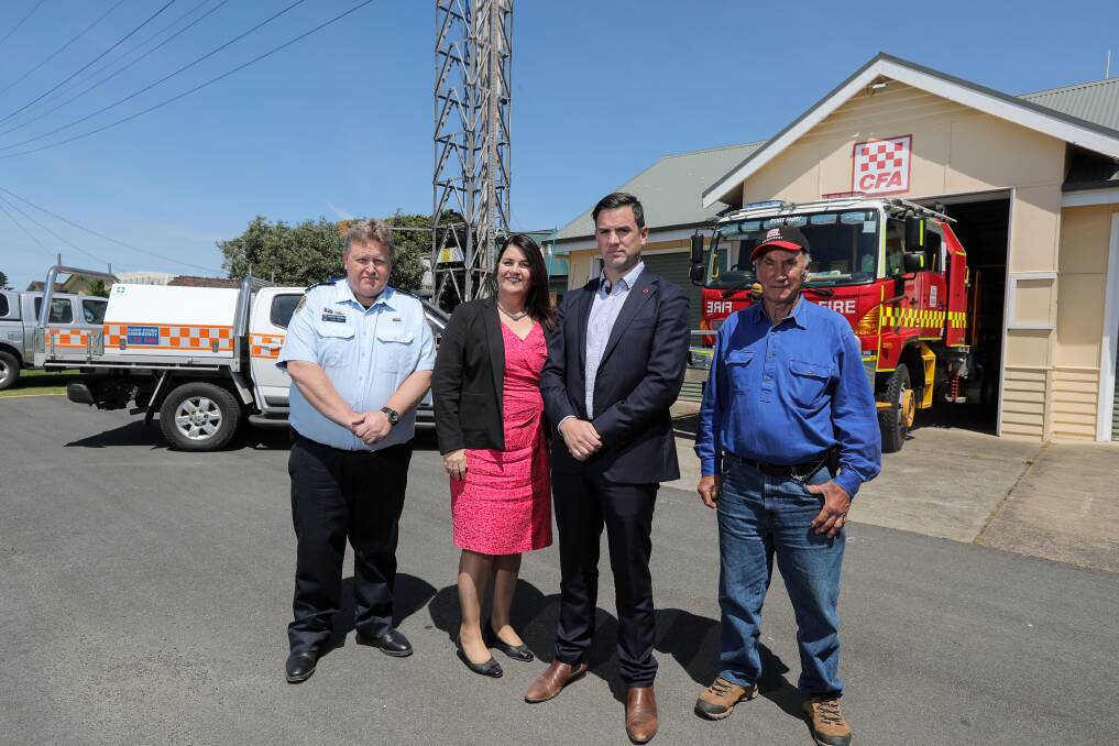 Call for change: Port Fairy SES unit controller Stephen McDowell, South West MP Roma Britnell, Opposition Emergency Services spokesman Brad Battin and Port Fairy CFA brigade captain Garth Palmer would like to see the two services co-located. Picture: Rob Gunstone