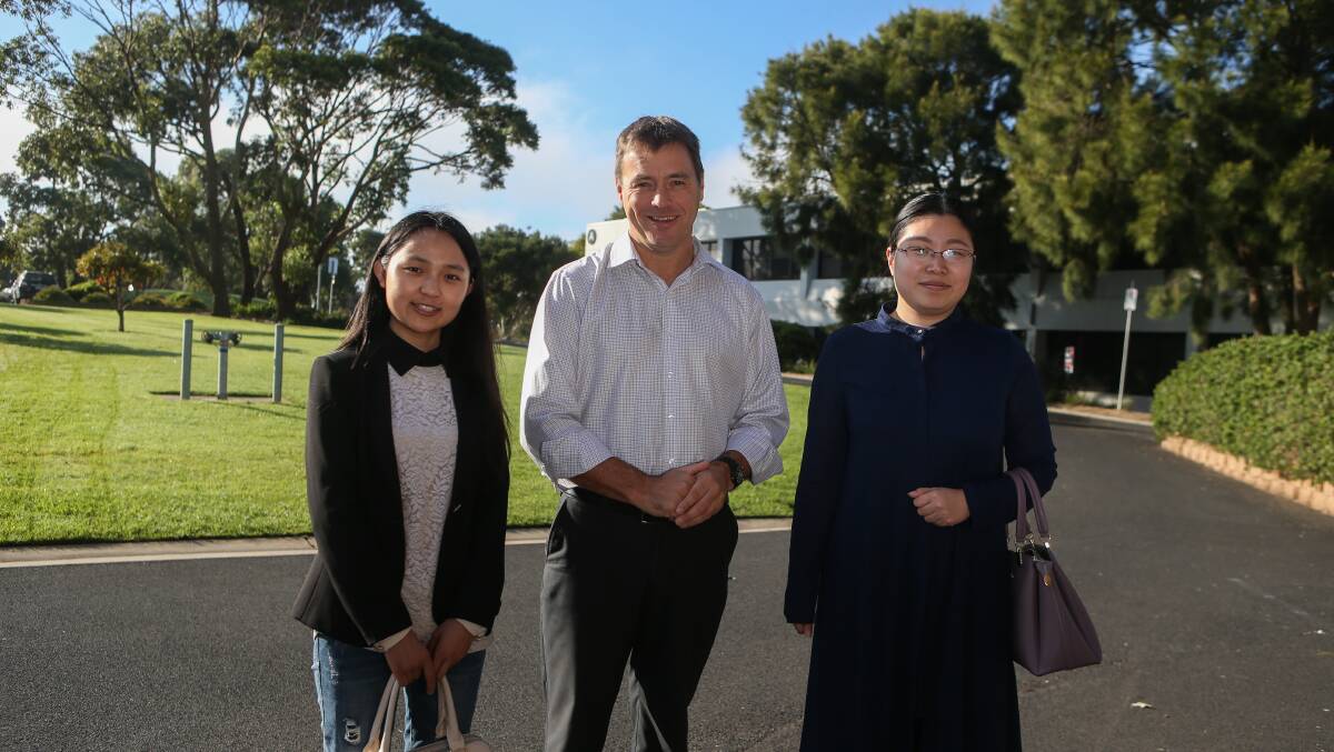 Exchange: Chinese visitors Xue Shen and Ming Hu and Deakin University's Alistair McCosh during their tour of the campus. Picture: Amy Paton