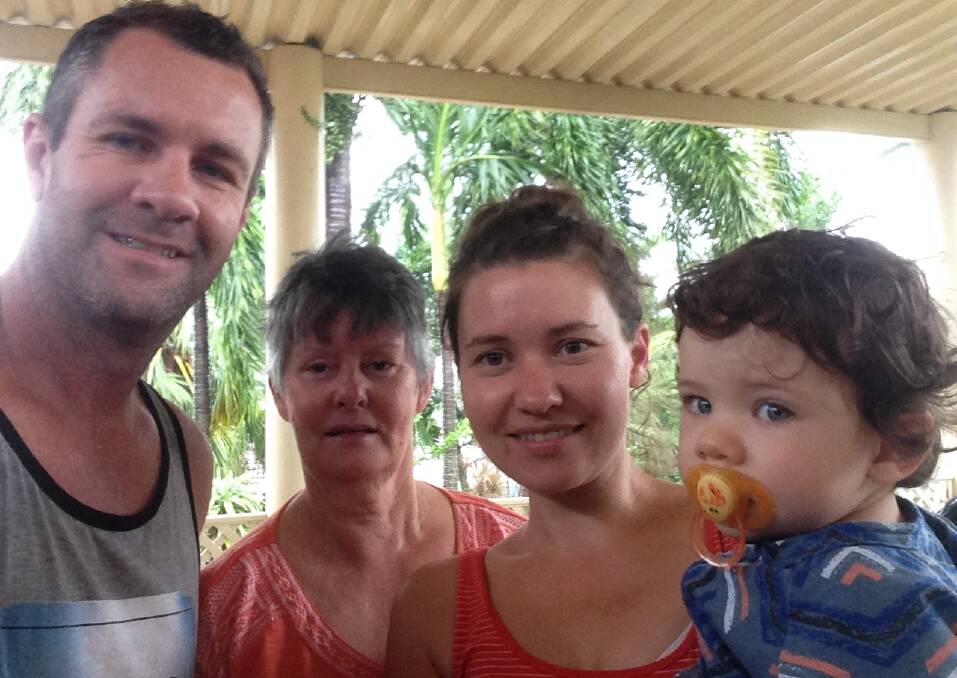 Paul and Susanne Gurry, with son Louie, 18 months, and mum Jan Norton in Blacks Beach, Queensland waiting out Cyclone Debbie. 