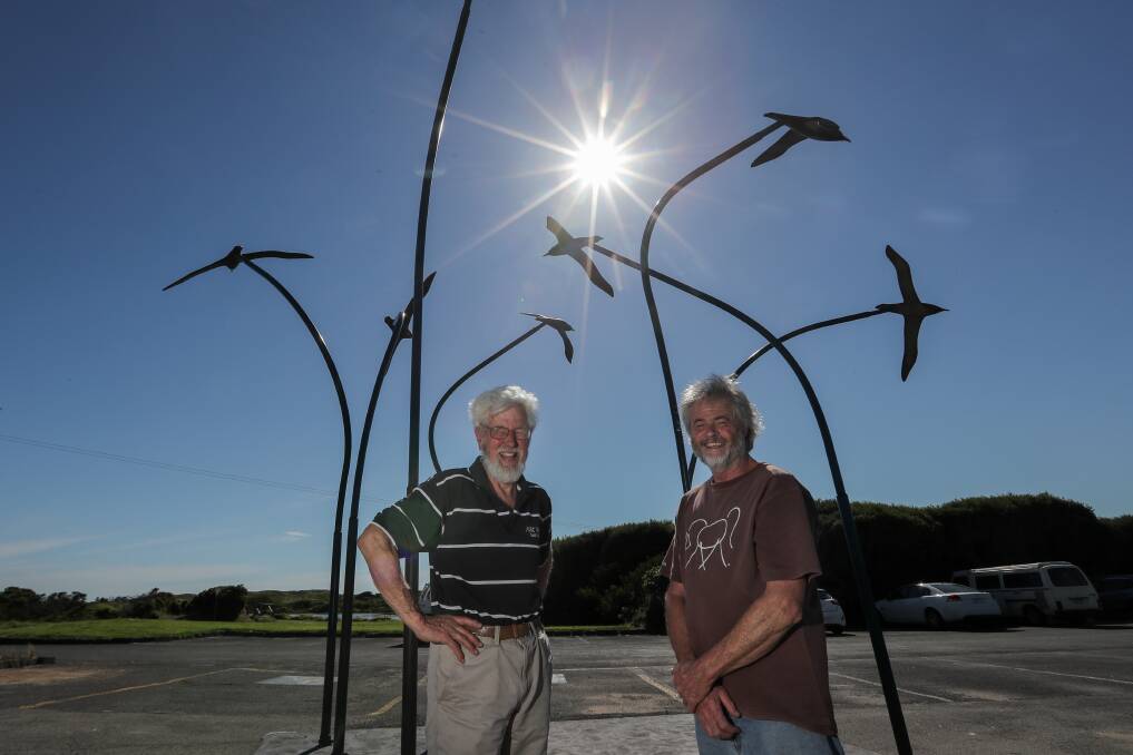 Flying high: Port Fairy sculptor Don Stewart and Friends of Griffiths Island management committee member Marten Syme with the new sculpture at the entrance to Griffiths Island. Picture: Morgan Hancock
