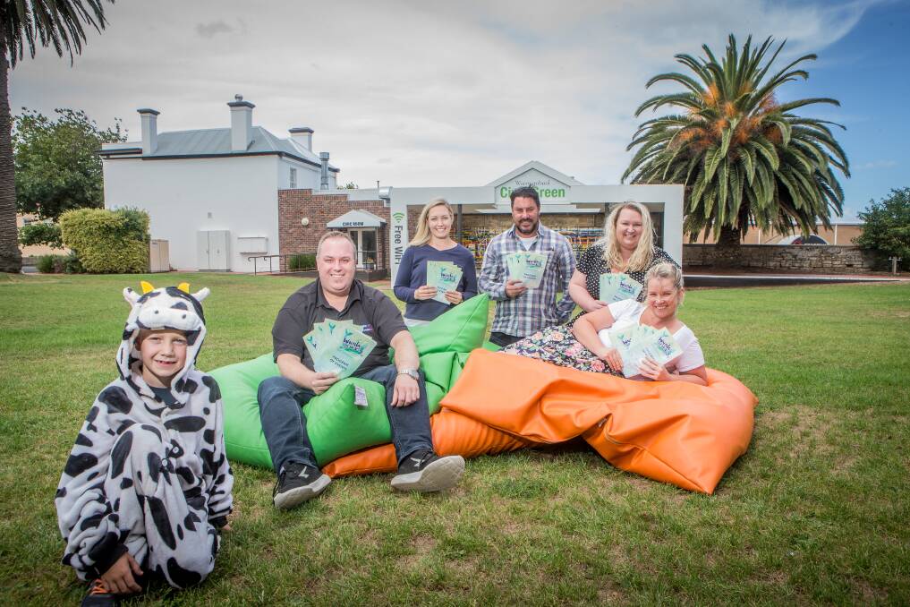 New Moove: Jakob Scott (front) models a milk run outfit with Wunta Fiesta committee members Dave Drinkell, Ellie Read, Ashlee Scott, Shaun Noonan and Donna Gladman. Picture: Christine Ansorge