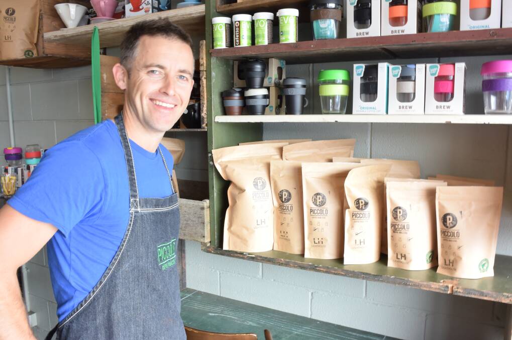 Piccolo Coffee Roasters owner Jon Darcy with some of their award-winning coffee beans. Picture: Madeleine McNeil