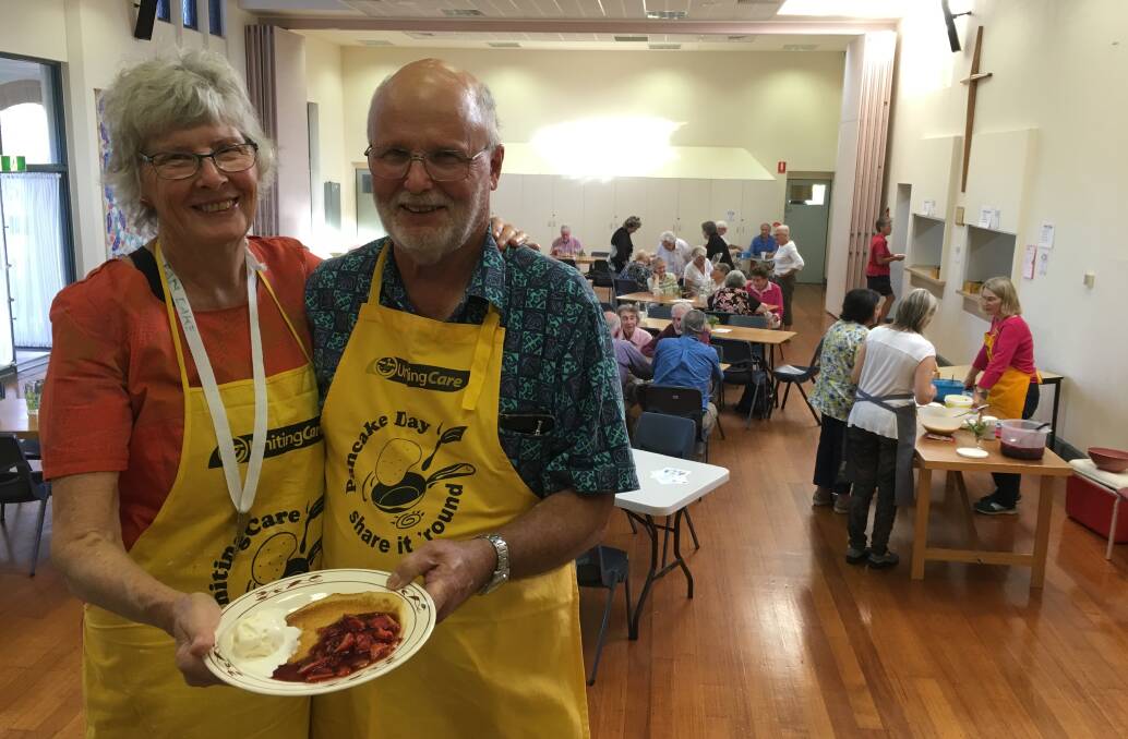 Tasty: Volunteer organisers Cally and Lex McRae at the Uniting Church Pancake Day in Warrnambool on Tuesday. More than 130 people attended the annual tradition. Picture: Madeleine McNeil