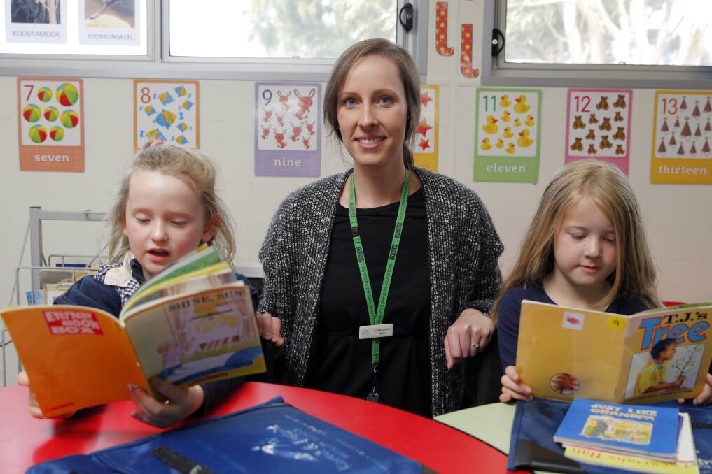 Integral: Koroit and District Primary School prep teacher Dubrelle Campbell, pictured last year, with students Gemma Hollinshead, 6, and Mimi Cooling, 6. The Nurture Nest program began in Koroit. The first session will be held in Mortlake this week. Picture: Rob Gunstone