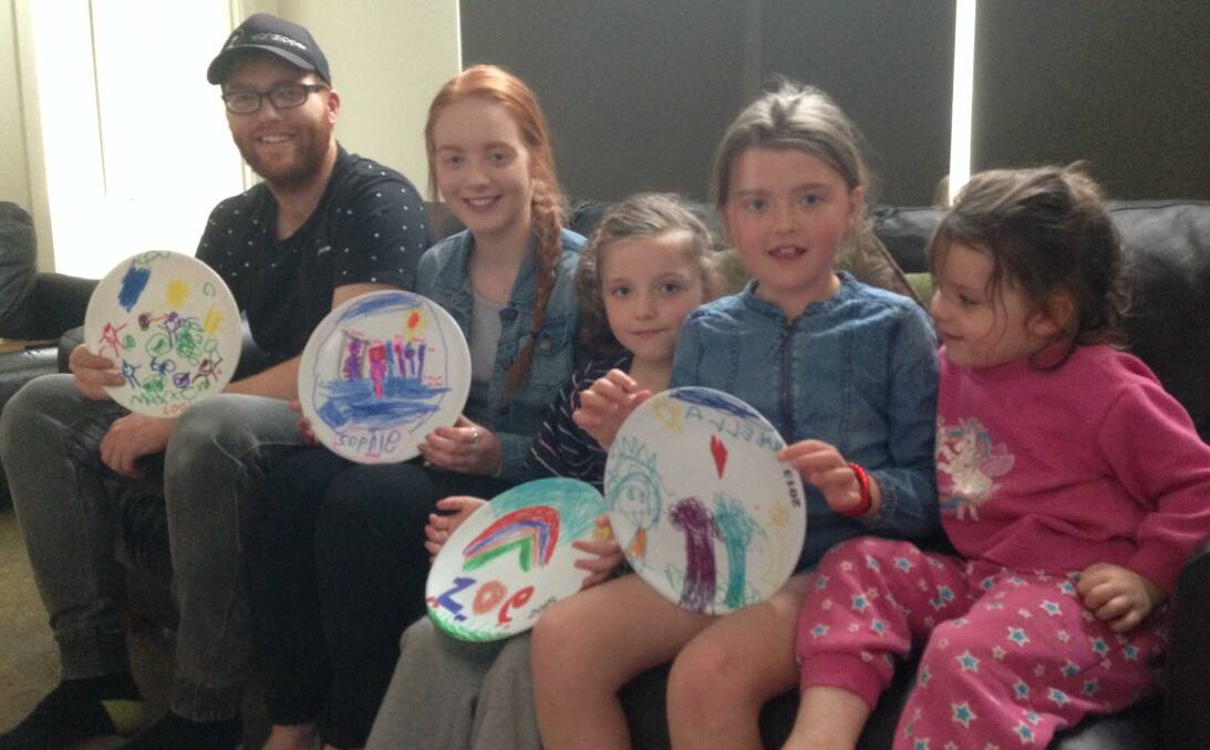 All ages: Koroit and District Kindergarten celebrates its 50th birthday next month. Pictured is Matt and Sophie Webster and Zoe and Majella Dobson with the plates they made at the kinder and Isla Dobson who will attend in 2018.