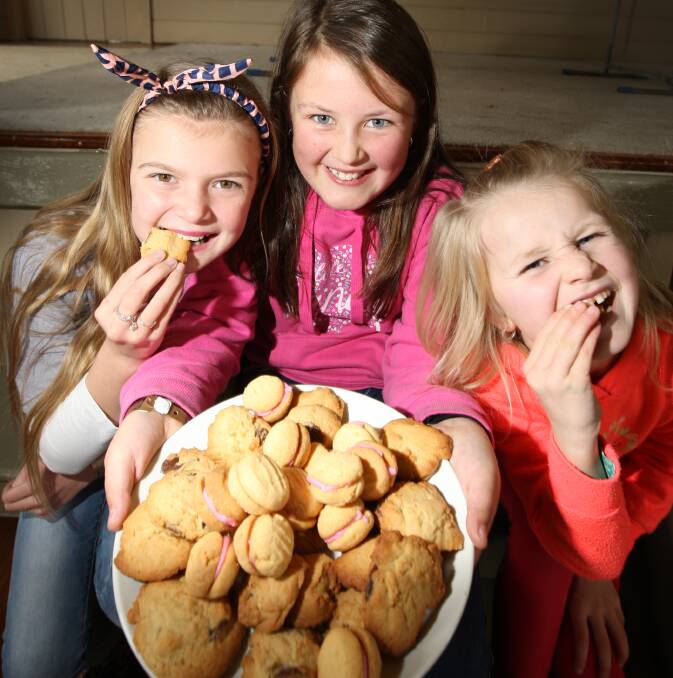 Biscuit heaven: Monique Brown,12, Keira Longmore,9, Kaitlyn Brown,6, are looking forward to the Kirky Bikkie Bake-off to be held on Sunday from 1.30pm . Picture: ANGELA MILNE

